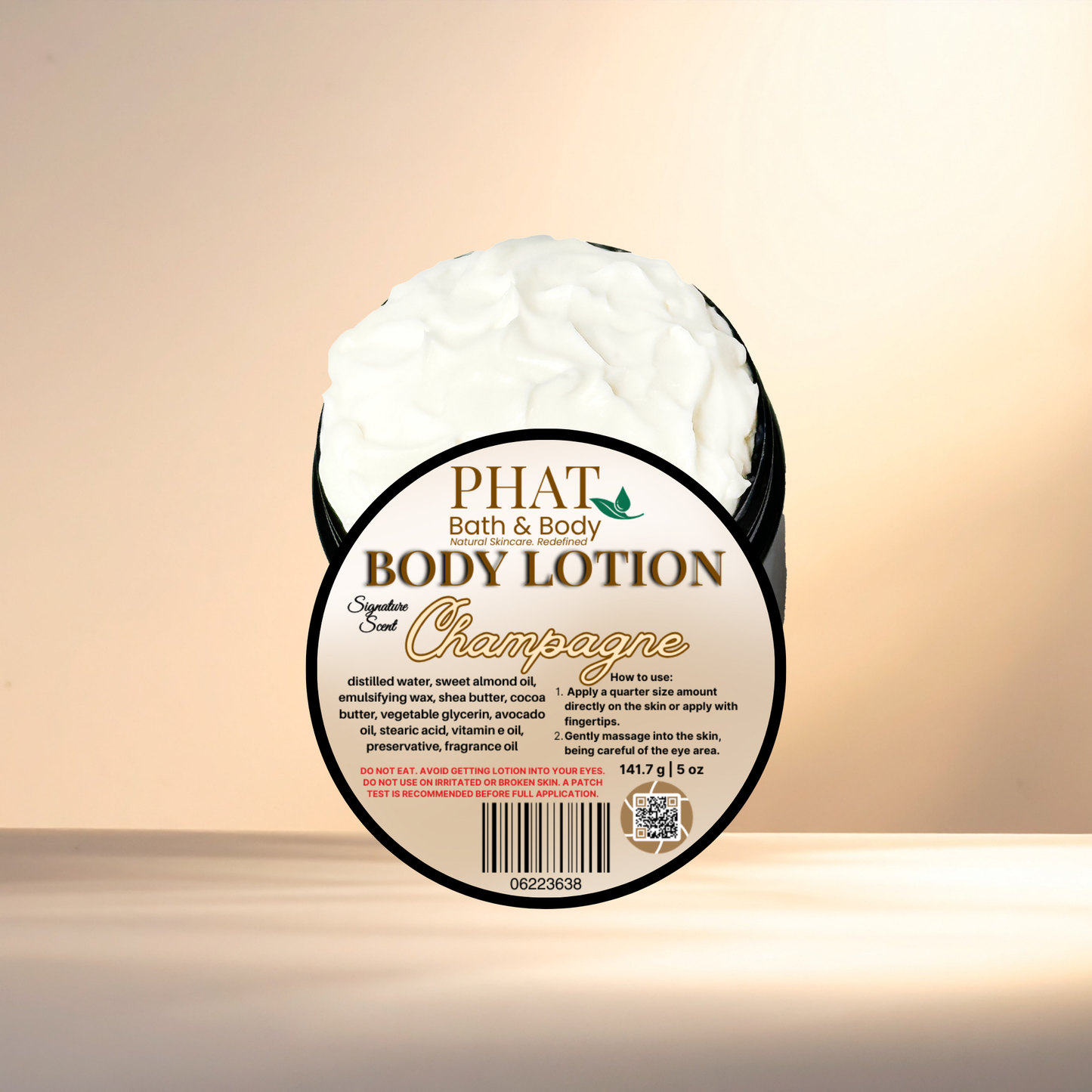Body lotion container labeled 'Phat Bath & Body Champagne' on a gradient background
