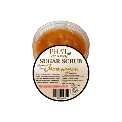 Jar of Champagne-scented sugar scrub with 'Phat Bath & Body' label on a white background