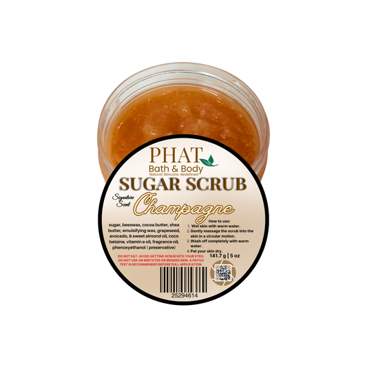 Jar of Champagne-scented sugar scrub with 'Phat Bath & Body' label on a white background