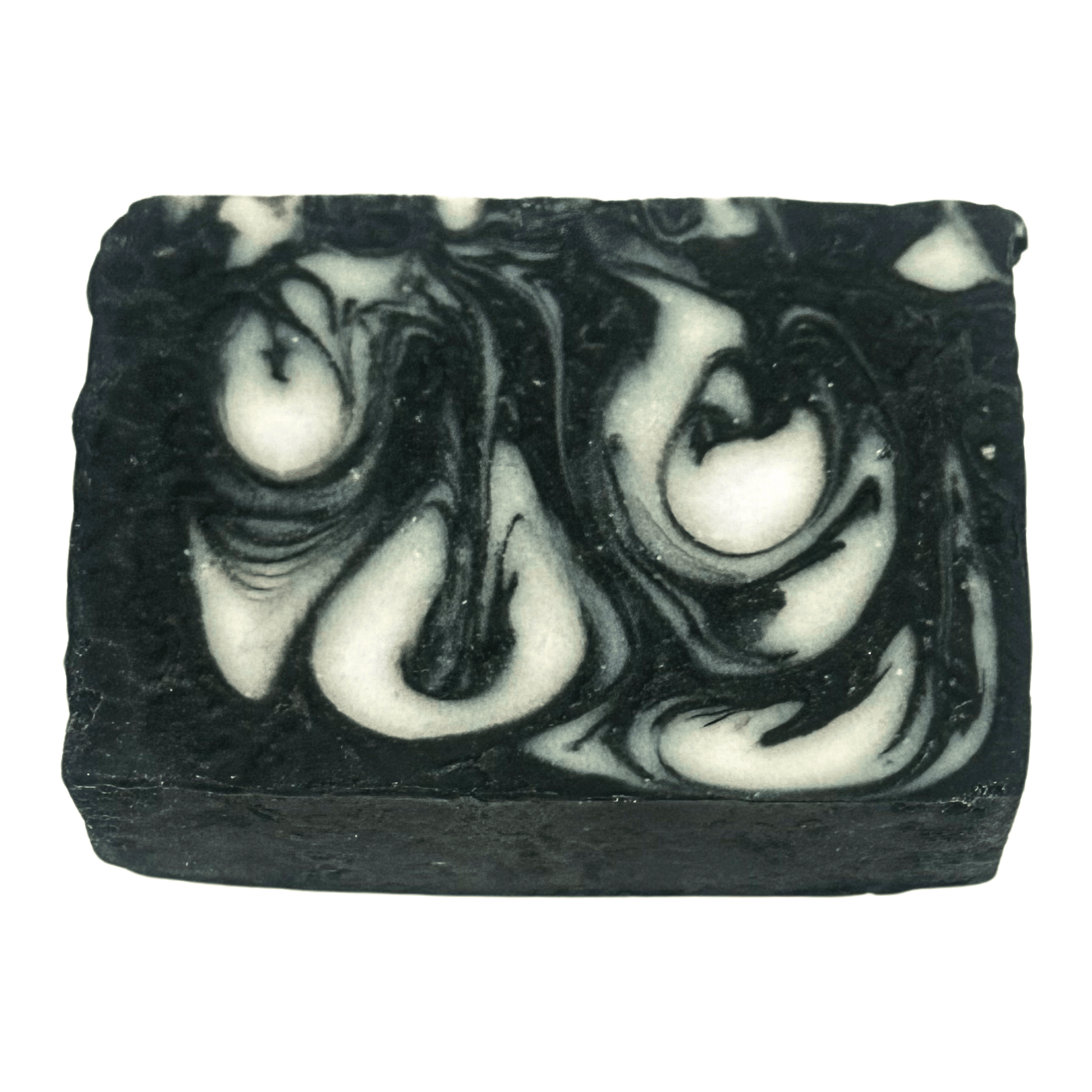 Black and white swirled charcoal soap bar on a white background