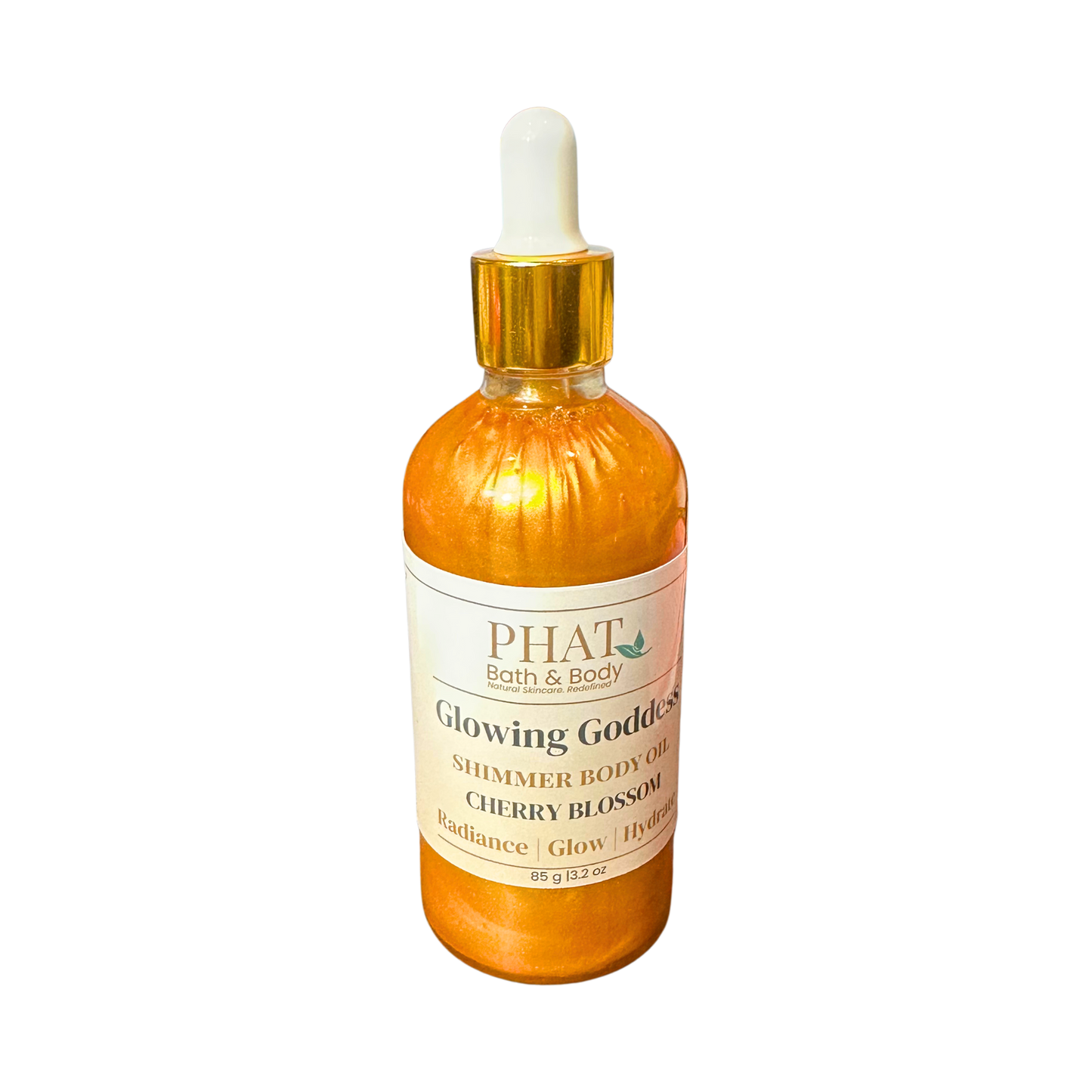 Orange bottle of 'Glowing Goddess' shimmer body oil by Phat Bath & Body on a white background
