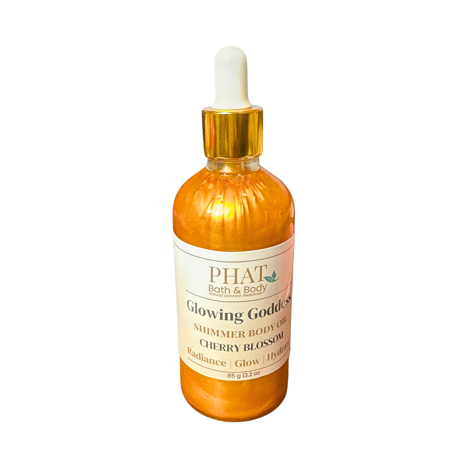 Orange bottle of 'Glowing Goddess' shimmer body oil by Phat Bath & Body on a white background