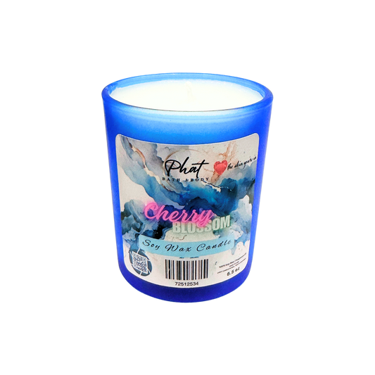 Blue candle with a label on a white background