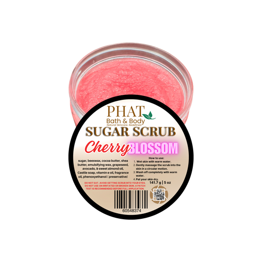 Jar of cherry blossom sugar scrub with a label on a white background