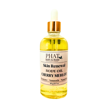 Bottle of Phat Bath & Body Skin Renewal Body Oil Cherry Merlot on a white background