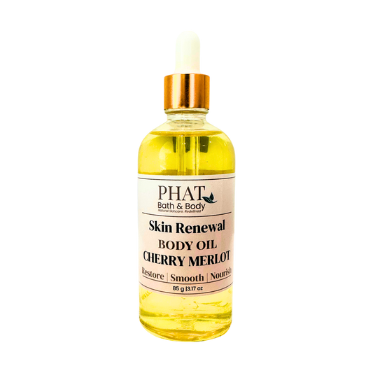 Bottle of Phat Bath & Body Skin Renewal Body Oil Cherry Merlot on a white background