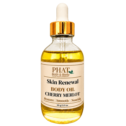 Phat Bath & Body Cherry Merlot Skin Renewal Body Oil, 3.5 oz golden body oil in a clear glass dropper bottle with a gold cap and cream label.