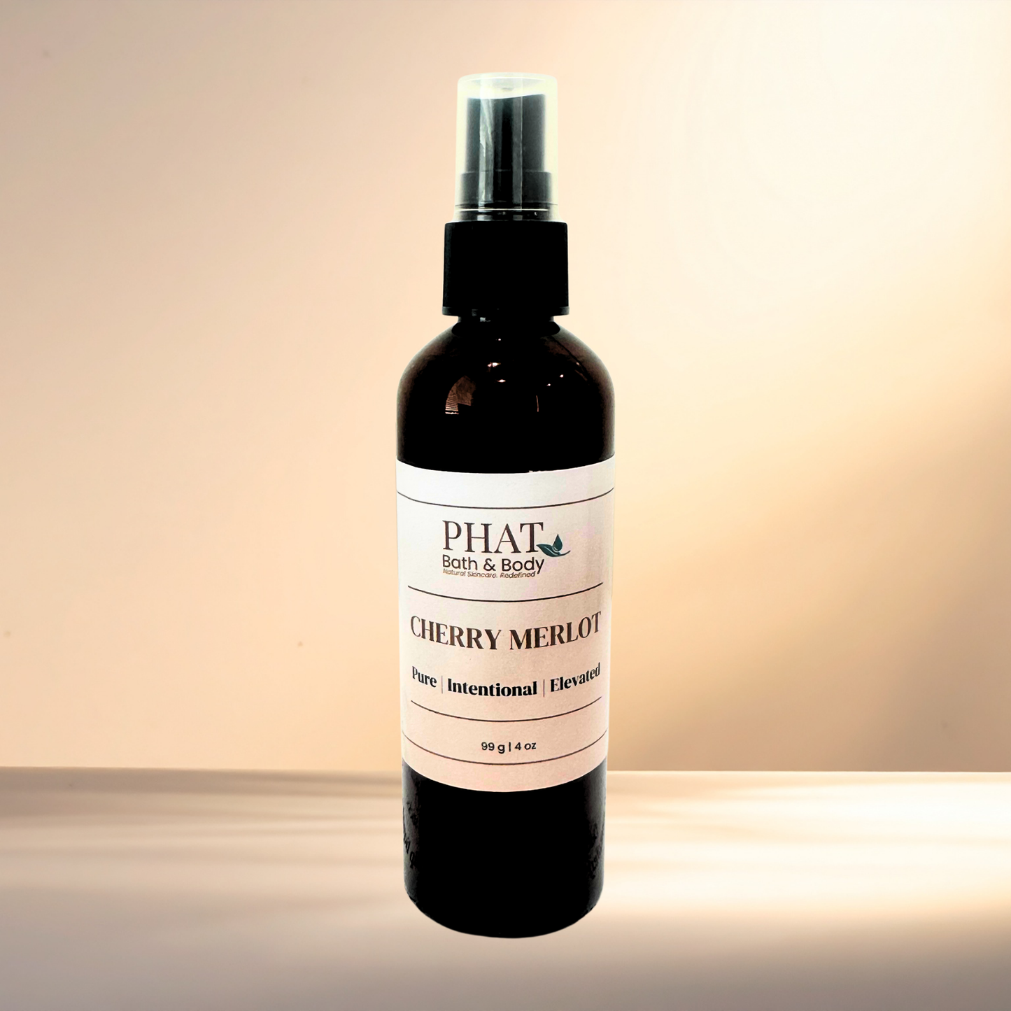 Bottle of 'Cherry Merlot' by PHAT Bath & Body on a gradient background