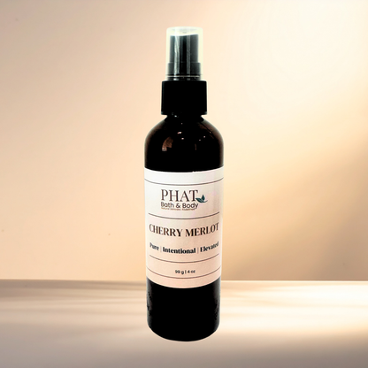 Bottle of 'Cherry Merlot' by PHAT Bath & Body on a gradient background