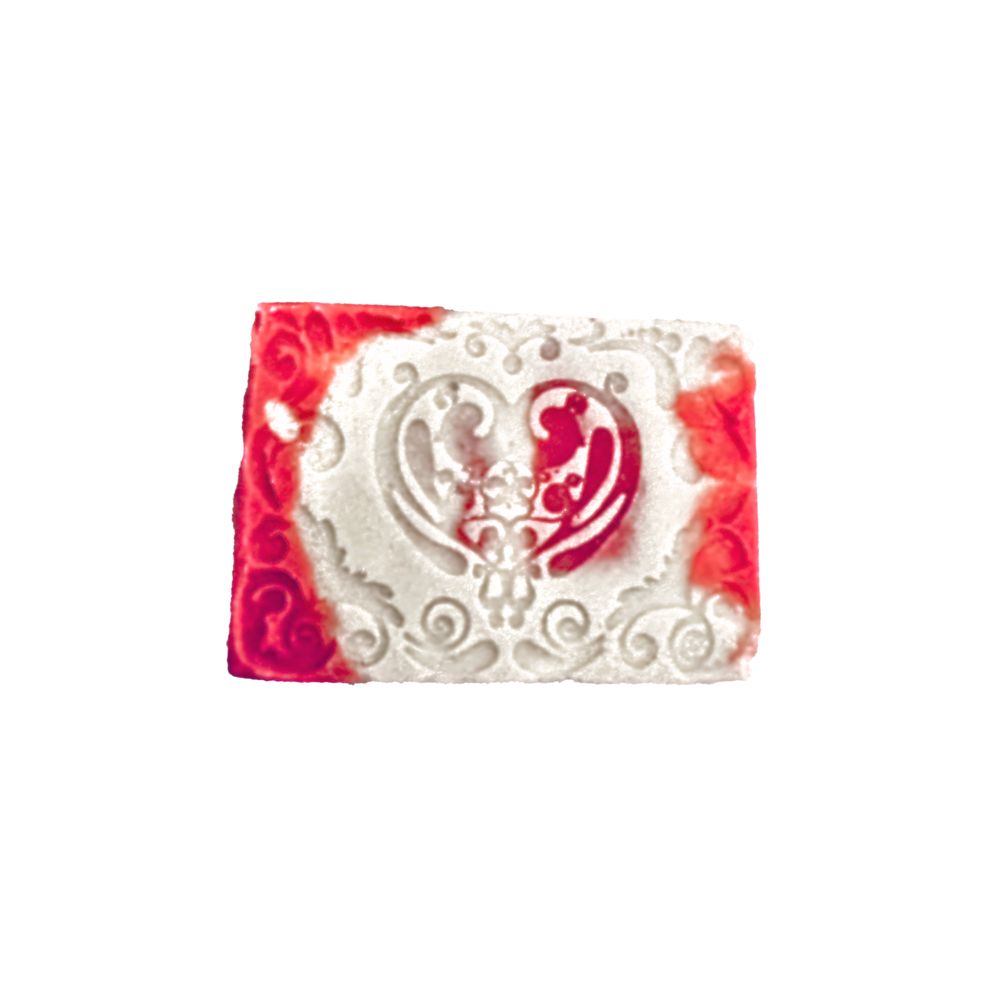 Decorative soap bar with red and white design on a white background