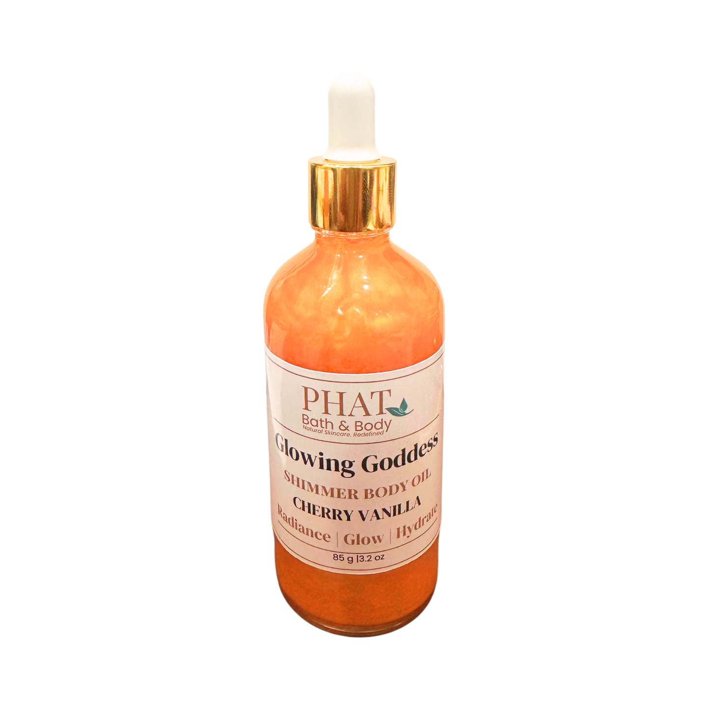 Bottle of 'Glowing Goddess' shimmer body oil by Phat Bath & Body on a white background