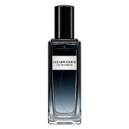 Phat Bath & Body Clearwater II Men’s Eau de Parfum in a tall clear glass perfume bottle with black cap, warm tan label, and cool blue-gray fragrance, shown as the main product image.