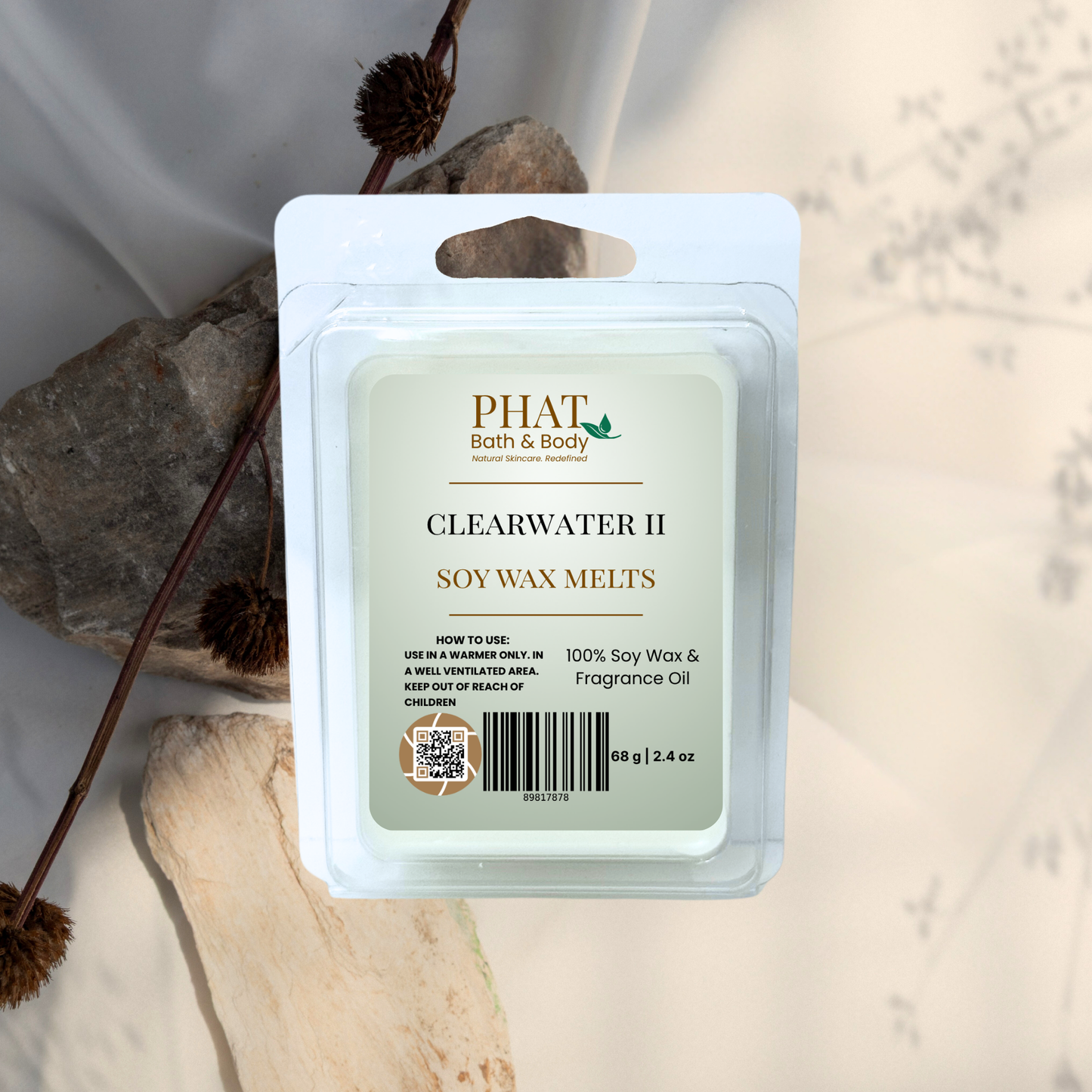 Pack of Phat Bath & Body Clearwater II soy wax melts on a natural stone background