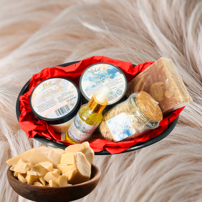 Assorted skincare products including jars, bottles, and a soap bar on a fluffy surface.