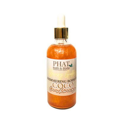 Bottle of 'Shimmering Body Oil' by Phat Bath & Body on a white background