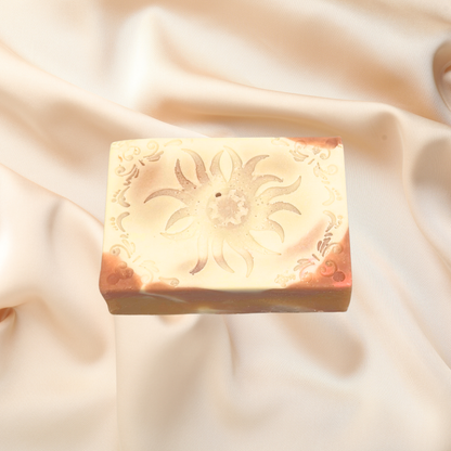 Colorful soap bars on a beige fabric background