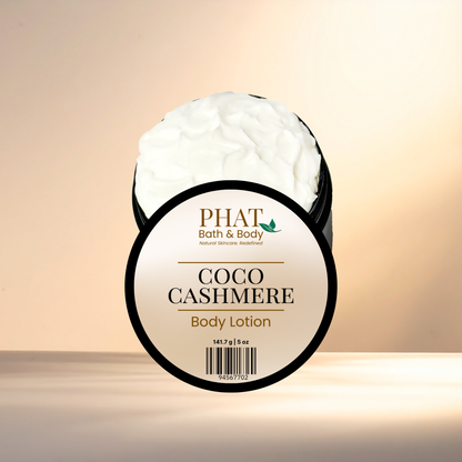 Body lotion jar labeled 'Coco Cashmere' by Phat Bath & Body on a gradient background