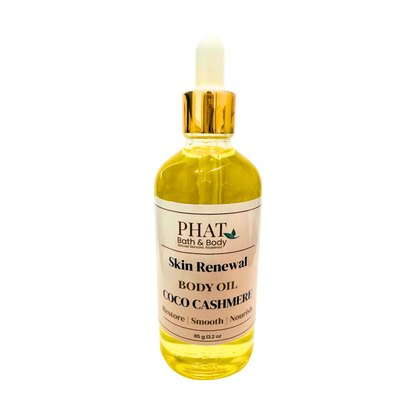 Bottle of Phat Bath & Body Skin Renewal Body Oil with a gold dropper on a white background