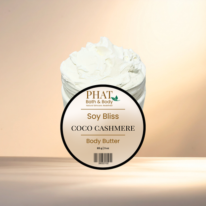 Body butter container labeled 'Soy Bliss Coco Cashmere' by Phat Bath & Body on a gradient background.