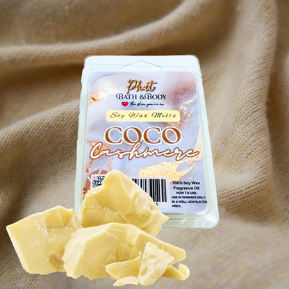 Coco Cashmere soy wax melts packaging with wax pieces on a beige fabric background