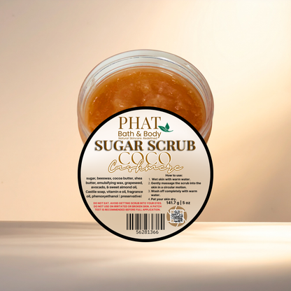 Jar of sugar scrub with a label on a light background