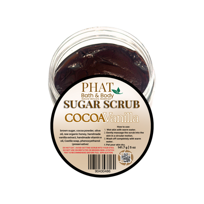 Cocoa Vanilla sugar scrub in a clear container with a label on a white background