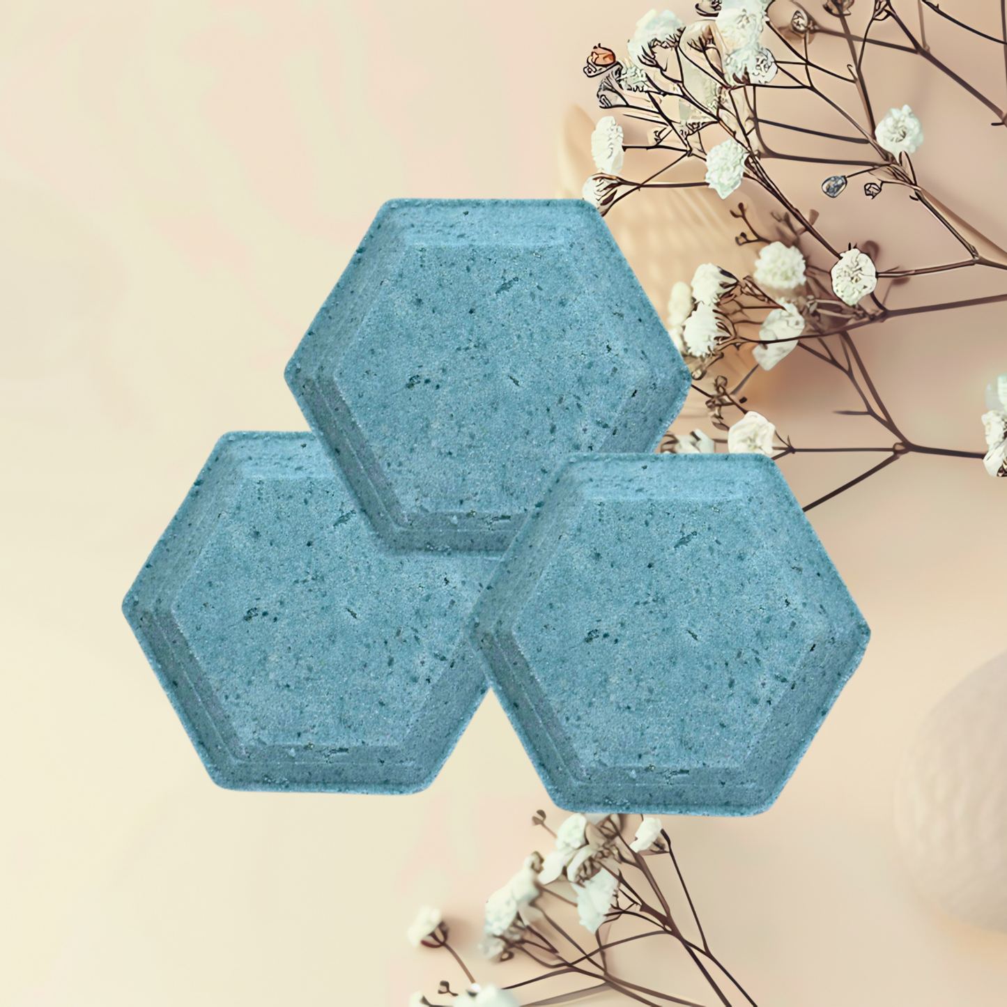 Three hexagonal blue steamers on a light pink background with white flowers.