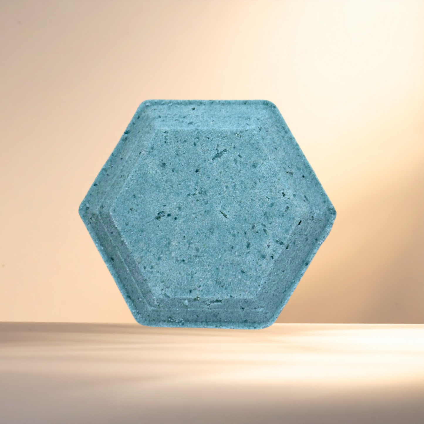 Hexagonal blue steamer on a beige background