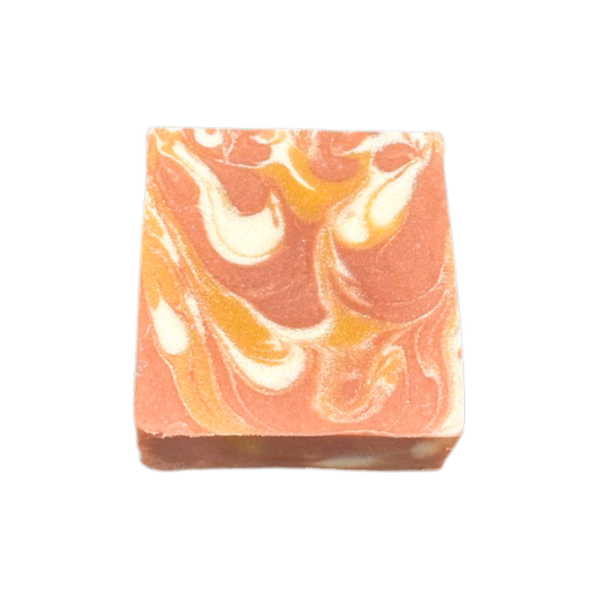 Bar of soap with orange and white swirl pattern on a white background