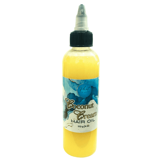 Bottle of coconut cream hair oil on a white background
