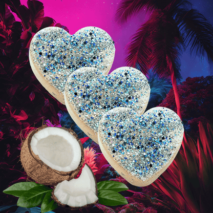Heart-shaped car freshie with glittery surface on a colorful tropical background