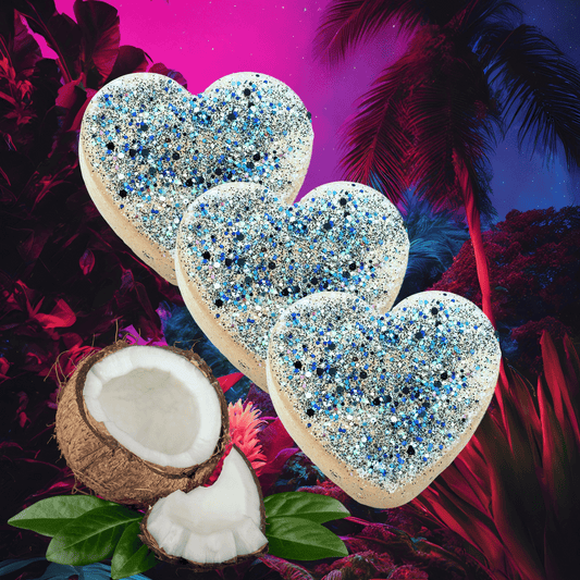Heart-shaped car freshie with glittery surface on a colorful tropical background