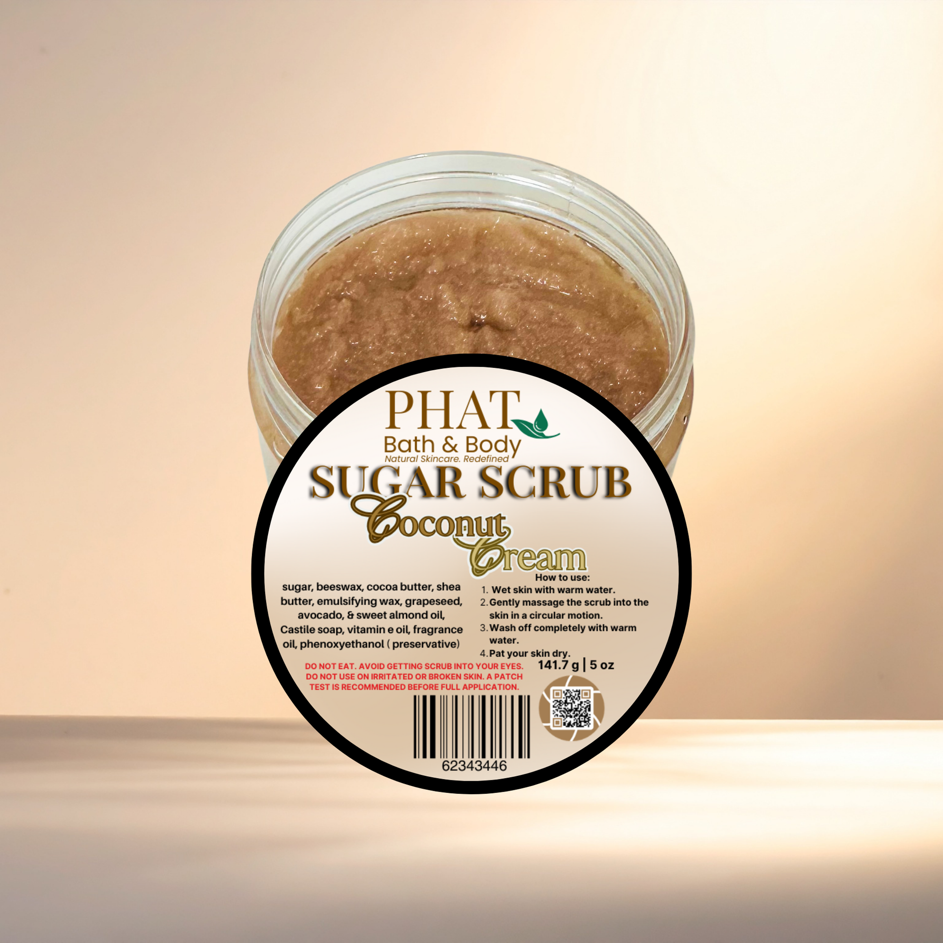Jar of Phat Bath & Body Sugar Scrub with a beige background