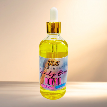 Bottle of body oil with a colorful label on a gradient background