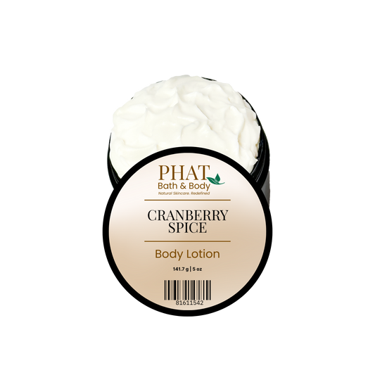 Phat Bath & Body Cranberry Spice 5 oz Body Lotion in an open black jar with labeled lid and rich white moisturizing lotion.
