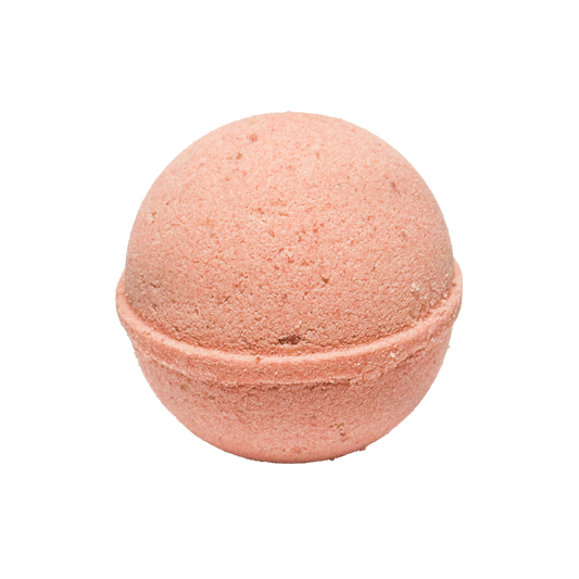 Pink bath bomb on a white background
