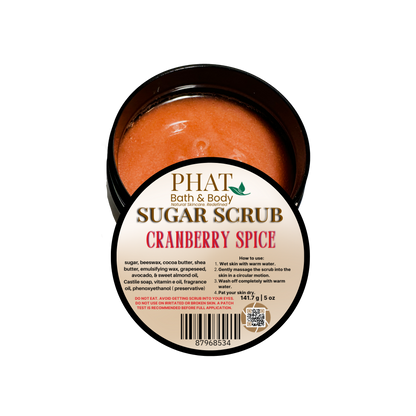 Jar of cranberry spice sugar scrub with 'Phat Bath & Body' branding on a white background
