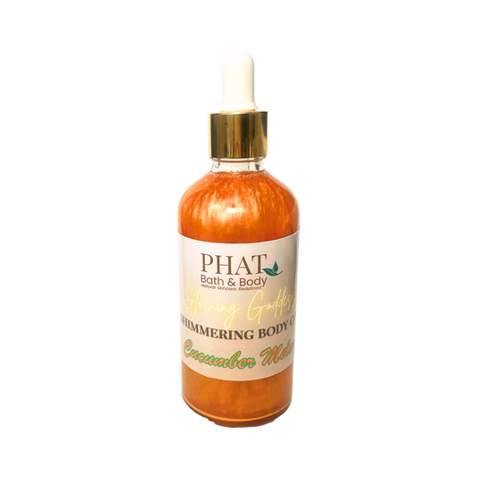 Bottle of 'Cucumber Melon' shimmering body oil from Phat Bath & Body on a white background