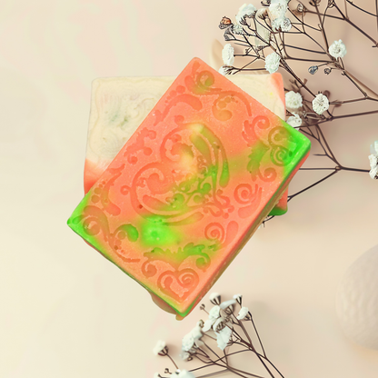 Colorful soap with decorative patterns on a light background with flowers