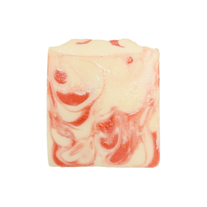 Bar of soap with pink and white swirled pattern on a white background