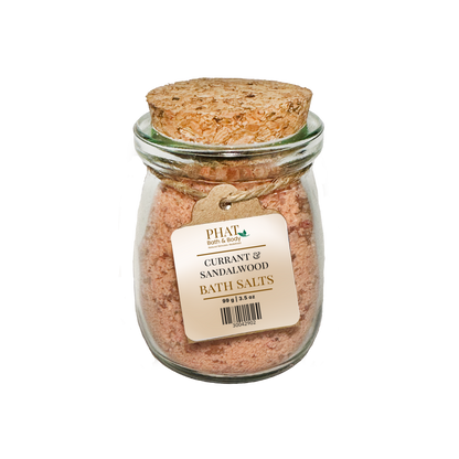 Jar of Currant & Sandalwood Bath Salts with cork lid on a white background