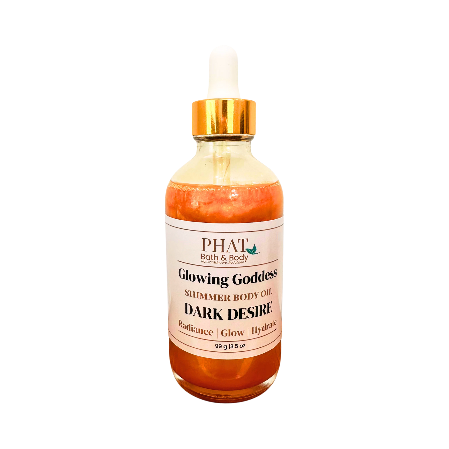 A glass bottle of PHAT Bath & Body 'Glowing Goddess' shimmer body oil in the 'Dark Desire' scent, featuring an amber-colored liquid, a white label, and a gold collar with a white dropper cap, set against a plain white background.