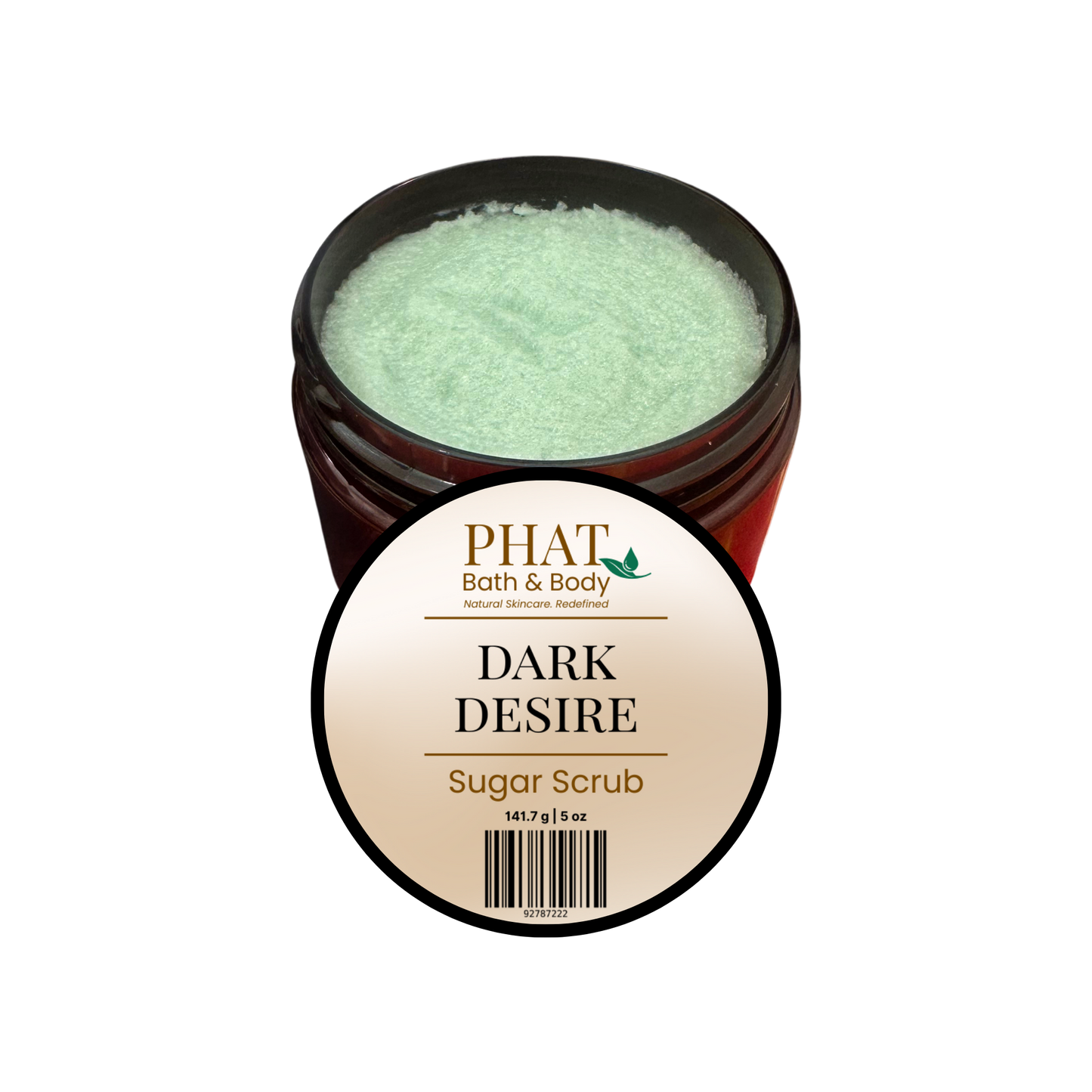 An open amber jar of PHAT Bath & Body 'Dark Desire' sugar scrub, showing the pale mint-green scrub inside, with a round product label in front on a plain white background.
