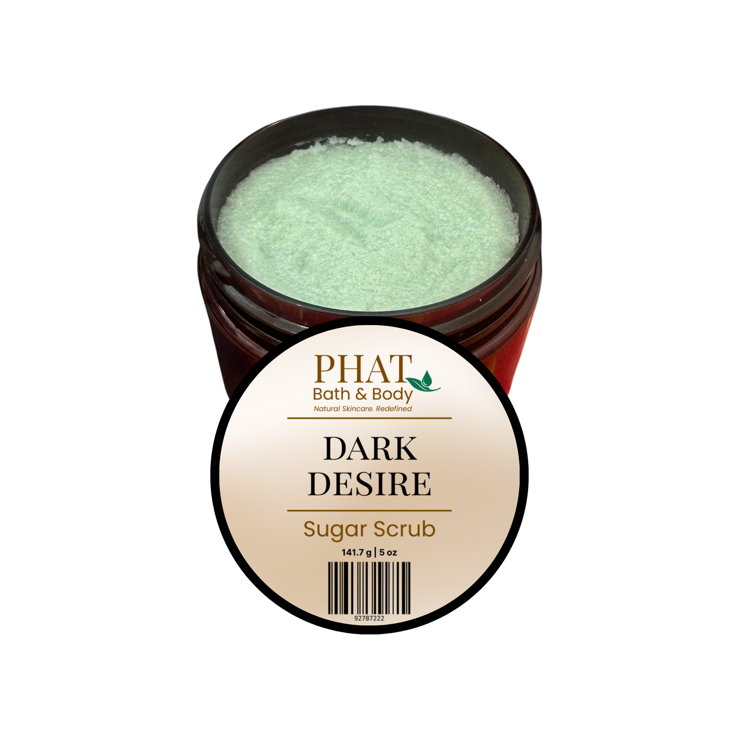 An open amber jar of PHAT Bath & Body 'Dark Desire' sugar scrub, showing the pale mint-green scrub inside, with a round product label in front on a plain white background.