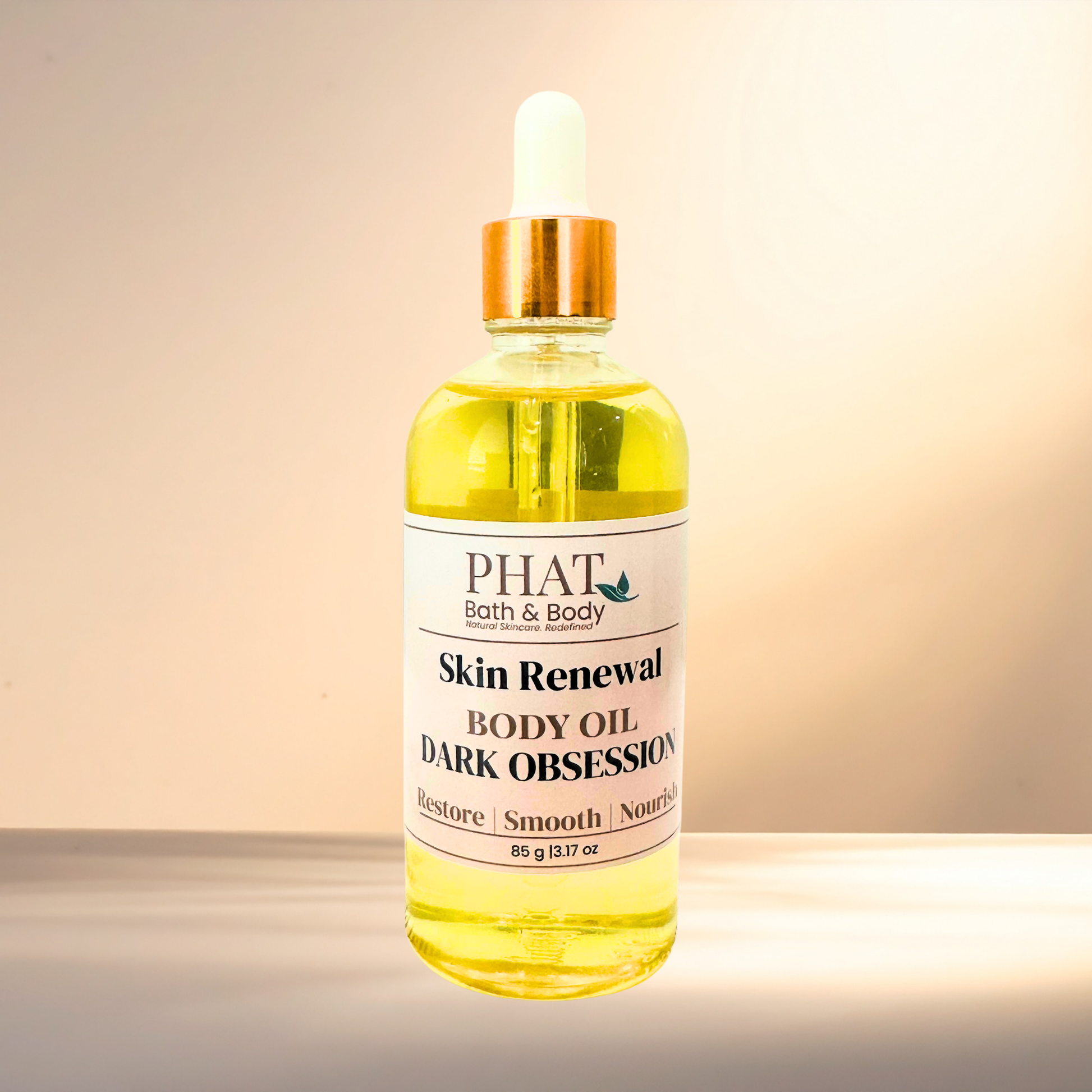 Bottle of PHAT Bath & Body Skin Renewal Body Oil on a gradient background