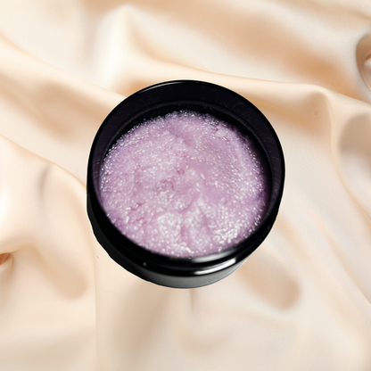 Black jar with purple scrub on a gradient background