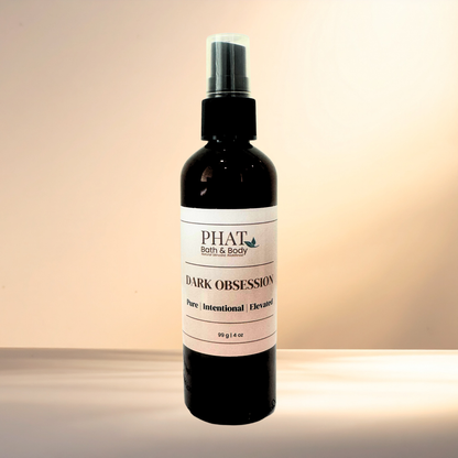 Bottle of 'Dark Obsession' by PHAT Bath & Body on a gradient background