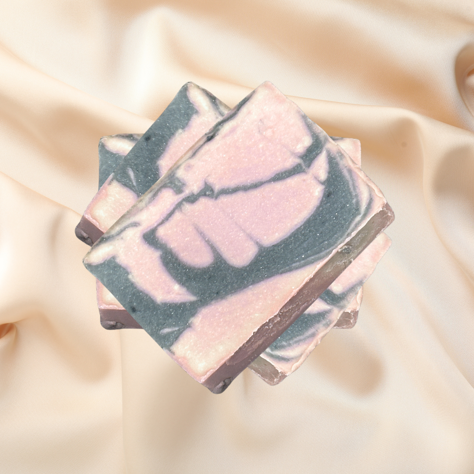 Marbled soap bar on a soft beige fabric background
