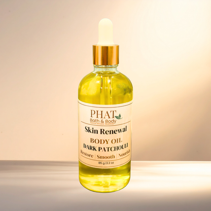 Bottle of PHAT Bath & Body Skin Renewal Body Oil on a gradient background