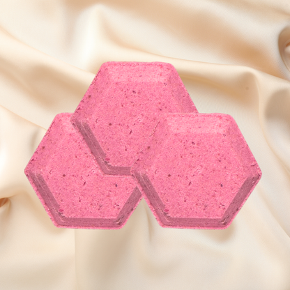 Hexagonal pink steamers on a beige fabric background
